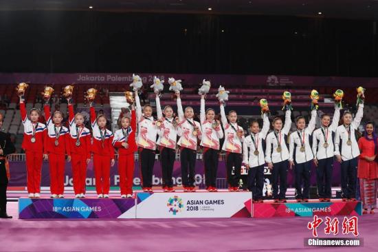 中国体操女团亚运12连冠 新帅乔良：目标还是向东京