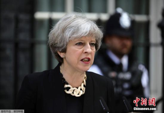 英首相推迟脱欧协议表决 仍称最后期限前能取得协议