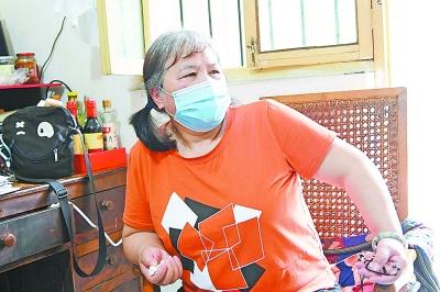 多次被抢救回来 重生的她用剪纸剪出“武汉抗疫图”