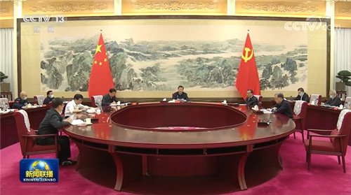 习近平会见国际奥委会主席巴赫