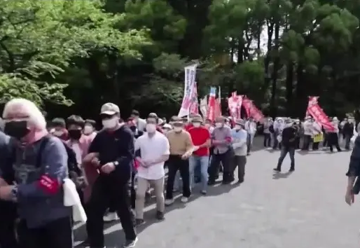 日本民众举行集会游行抗议拜登访日