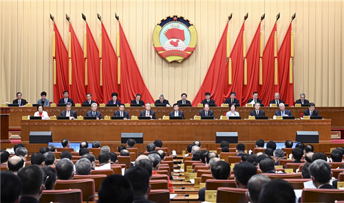 全国政协十四届常委会第一次会议开幕 王沪宁出席